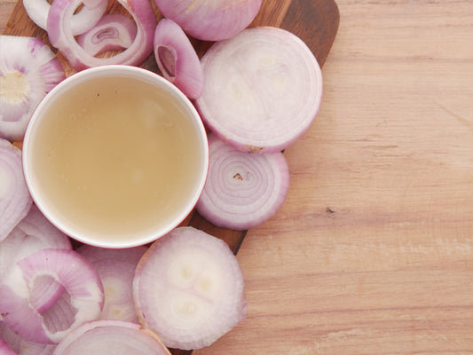 From Dull to Shiny: The Wonders of Onion Juice for Hair